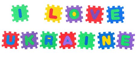 Message I Love Ukraine, from letters puzzle, isolated on white  の写真素材