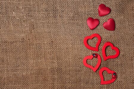 Red hearts no the textileの写真素材