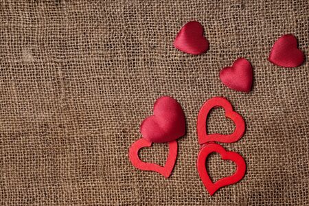 Red hearts no the textileの写真素材