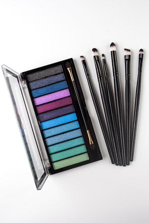 Different brushes and eyeshadow for make upの写真素材