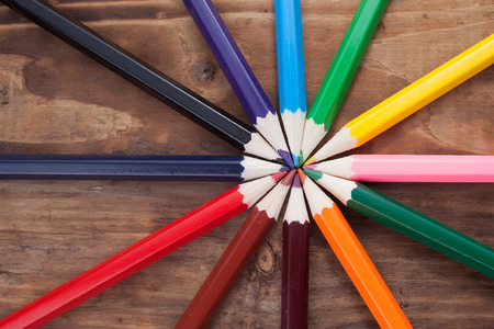 A colored pencils on a wooden tableの写真素材