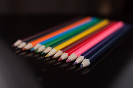 A colored pencils on a black tableの写真素材