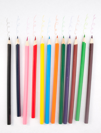 A colored pencils on a white paperの写真素材