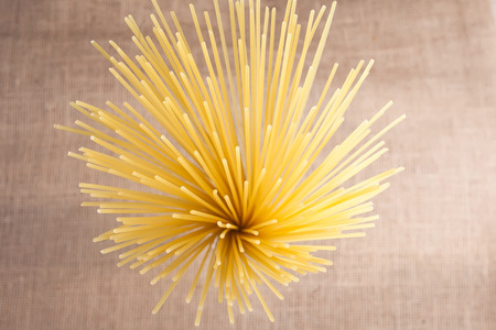 pasta macaroni from the up on a textureの写真素材