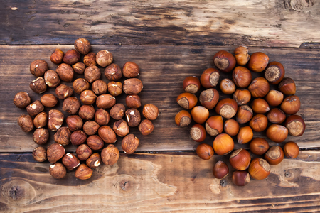 A hazelnuts on the dark wooden tableの写真素材