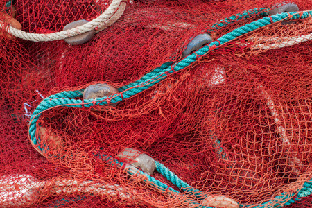 Close up view of fishing net marine backgroundの写真素材