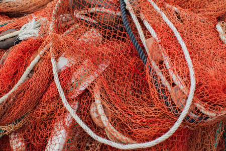 Close up view of fishing net marine backgroundの写真素材