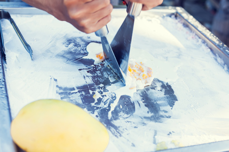 Art of making thai fruit ice cream in the streetの写真素材