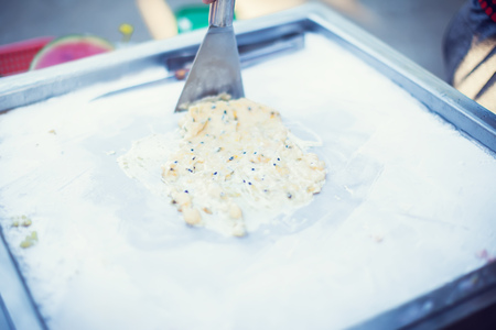 Art of making thai fruit ice cream in the streetの写真素材