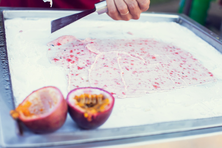 Art of making thai fruit ice cream in the streetの写真素材
