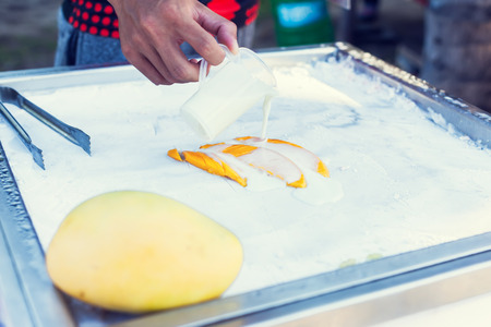 Art of making thai fruit ice cream in the streetの写真素材