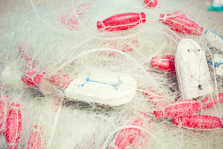 Background of fishing nets and floatsの写真素材