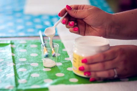 Children hands making artworks with wood and paint crafts. workplace and handcraft Decoupage