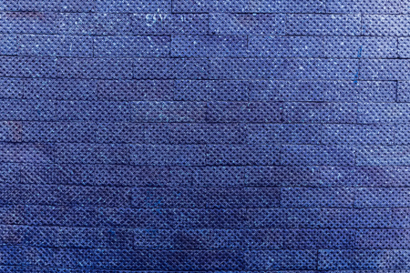Blue dark bricks wall background vintage and modern textureの写真素材