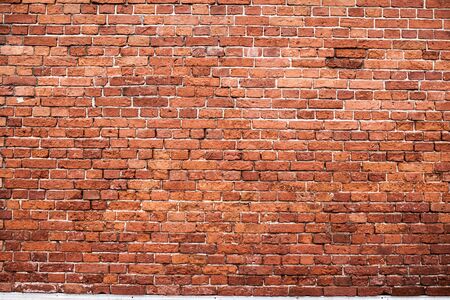 Vintage red bricks wall background.Grunge block texture
