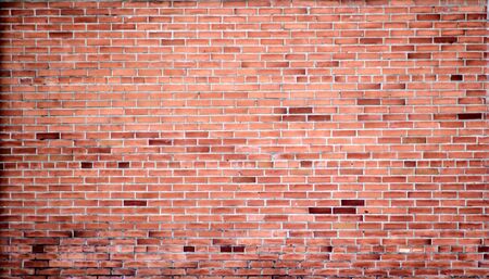 Red bricks wall background. Close-up building blocks backgroundの写真素材