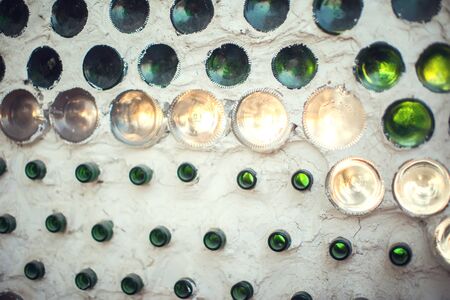 Glass bottles inside the wall background abstract textureの写真素材