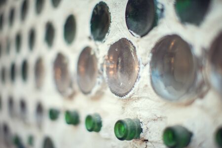 Glass bottles inside the wall background abstract textureの写真素材