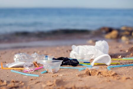 Different Garbage on the beach. Environmental pollution conceptの写真素材