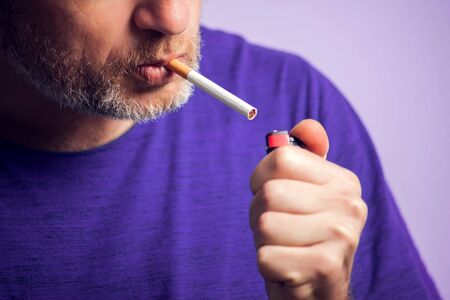 Close up of Man smoking cigarette. People, healt care conceptの写真素材