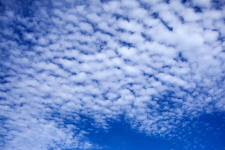 Blue sky background with a tiny cloudsの写真素材