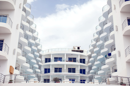 White color building with balcony. Architecture and design concept.のeditorial素材