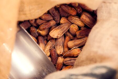 Bag full of dry dates. Traditional arab food. Close upの写真素材
