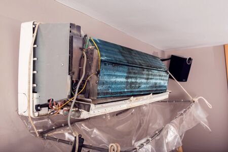 Air conditioner with water storage after cleaning. Air conditioning repairの写真素材