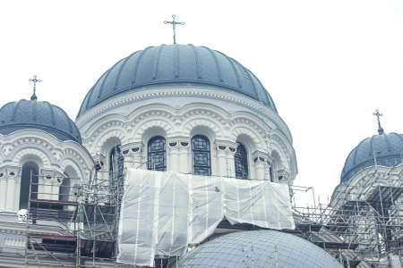 Cathedral reconstruction in Kaunas city, scaffolding construction. Building facade renovation.の写真素材