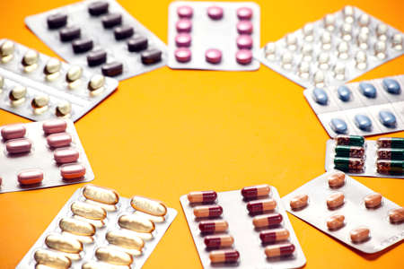 Capsules pill in blister packaging. Pharmaceutical industry concept. Pharmacy drugstore. Antibiotic...