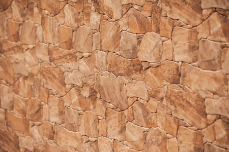 Stone wall surface. Block facade background