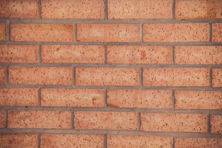 Red brick wall surface. Block urban background
