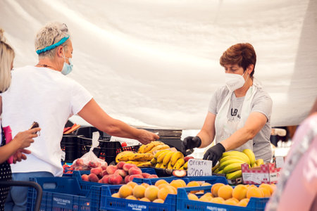 Torrevieja, Spain, 11 of June 2021. Outdoor market with buyers and sellers in Torrevieja, Spain, Costa Blancaのeditorial素材