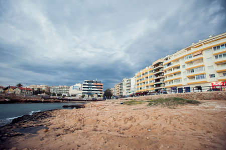Torrevieja, Spain, 27.04.2021, Sandy beach of Mediterranean sea in Torrevieja city, Costa Blancaの写真素材