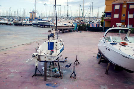 Torrevieja, Spain, 27.04.2021. Yacht repair dock. Boat fixing service. Costa Blancaの写真素材