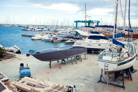 Torrevieja, Spain, 27.04.2021. Yacht repair dock. Boat fixing service. Costa Blancaの写真素材