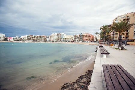 Torrevieja, Spain, 27.04.2021, Sandy beach of Mediterranean sea in Torrevieja city, Costa Blancaの写真素材