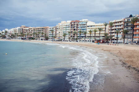 Torrevieja, Spain, 27.04.2021, Sandy beach of Mediterranean sea in Torrevieja city, Costa Blancaの写真素材
