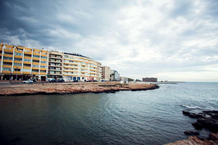 Torrevieja, Spain, 27.04.2021, Sandy beach of Mediterranean sea in Torrevieja city, Costa Blancaの写真素材
