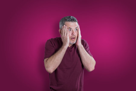 Scared and afraid man. Expressing the emotion of fearの写真素材