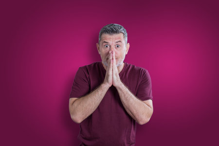 Scared and afraid man. Expressing the emotion of fearの写真素材