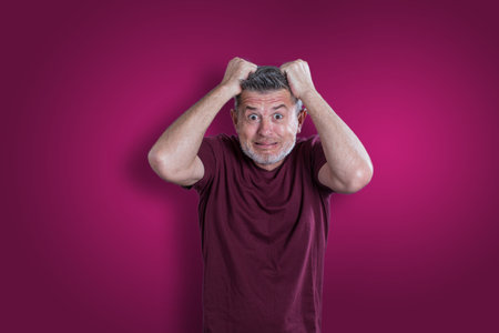 Scared and afraid man. Expressing the emotion of fearの写真素材