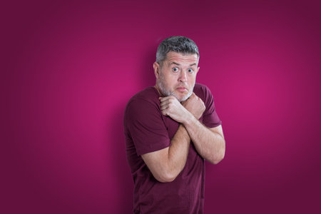 Scared and afraid man. Expressing the emotion of fearの写真素材