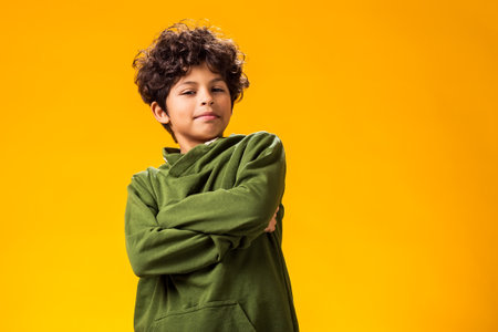 Child boy over yellow background. Emotions conceptの写真素材