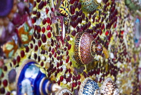 Walls adorned with a thai style color ceramic cup and bowl  Benjarong  の写真素材