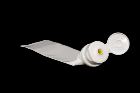 a empty of tooth paste container