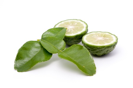 isolated kaffir lime with leaf on white background