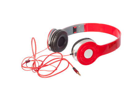 red headphones isolated on whiteの写真素材