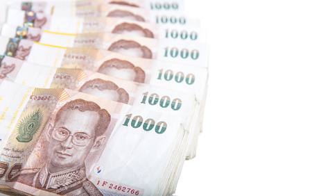 thai baht banknotes isolated on whiteの写真素材