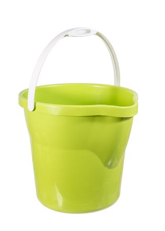 green plastic bucket isolated on whiteの写真素材